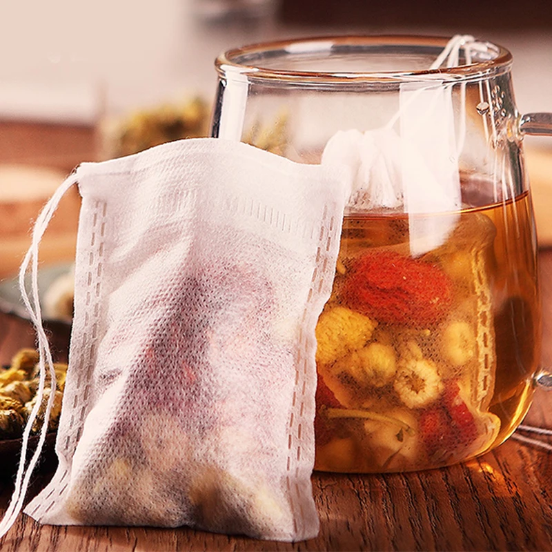 

Non-Woven 100Pcs Paper Empty Draw String Teabags Heat Seal Sieve Herb Loose Tea Bag Colander Gadgets For The Kitchen Novelties