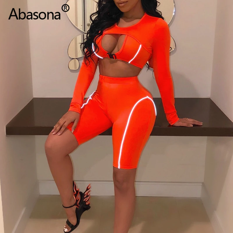Abasona комплект из 2 предметов, отражающие сексуальные Оранжевые Комбинезоны, открытый бюст, укороченный топ и байкерские шорты, осенне-зимние Клубные облегающие Комбинезоны для вечеринки