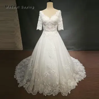 شراءفاخر الكرة ثوب العاج الرباط فستان الزفاف 2018 مع كريستال العاهل الكنيسة نصف الأكمام الزفاف أثواب مخصص رداء دي Mariee