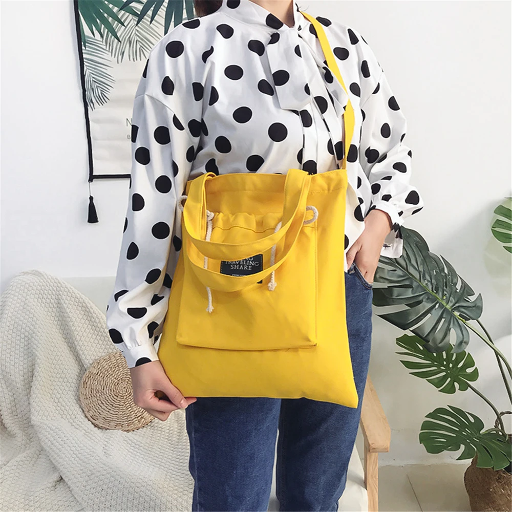 

Creative Solid Color Yellow Red Handbag Durable Canvas Casual Cross Body Bags with Personalized Outside Drawstring Pocket Totes