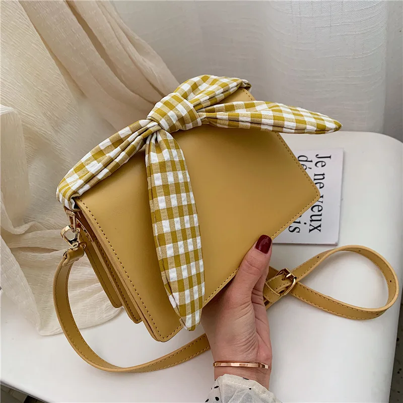 

Niche design on the new girl new bow versatile shoulder bag slanting small square bag tide