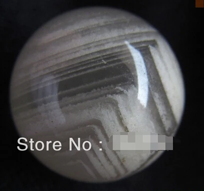 

A natural layers phantom quartz rock crystal sphere (0601)