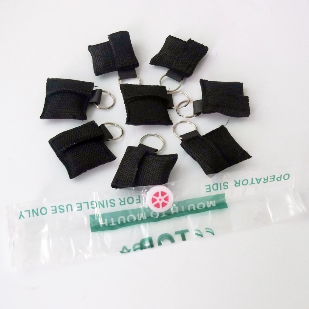 100pcs Handy CPR Mask With Keychain Ring AED Training Emergency Face Shield Artificial Respiration Barrier Healthy Care Tool