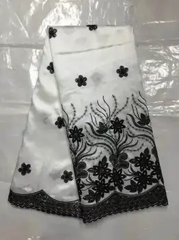 

New design 2017 elegant white bottom with black water-soluble embroidery lace fabric with sequins! High quality satin george lac