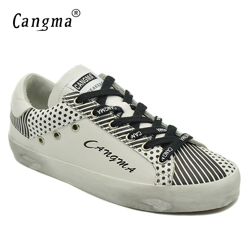 sapato listrado preto e branco