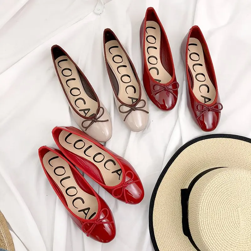 

2018autumn new flat bottom women's shoes Korean version of the simple bow shallow mouth small single shoes wild casual shoes.
