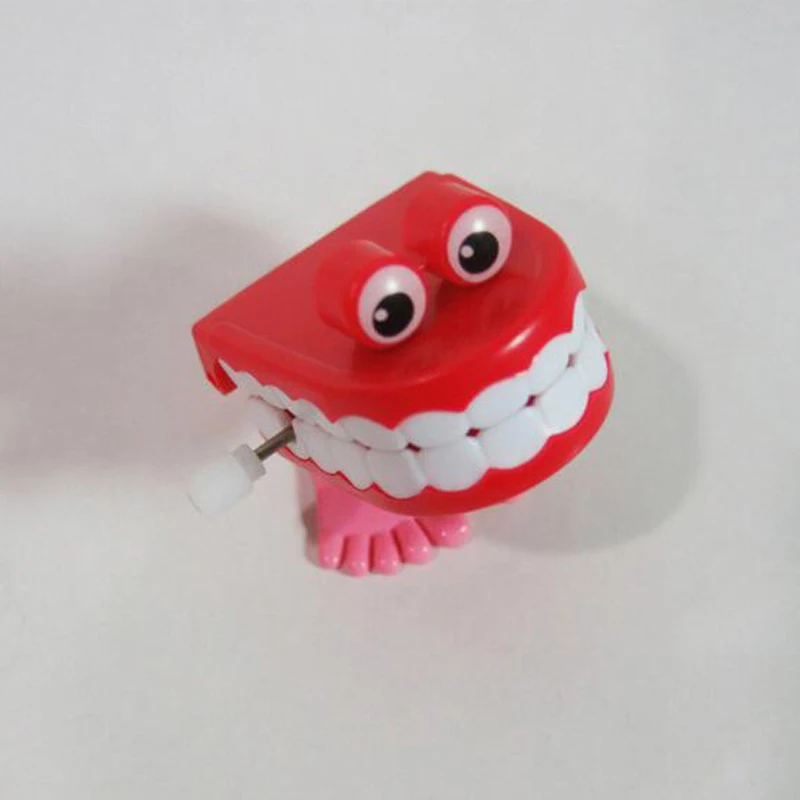 

1pcs Lovely Clockwork Jumped Teeth Two Paragraph Styles Wind Up Toys Classic Kids Toys For Children Random Color Gifts