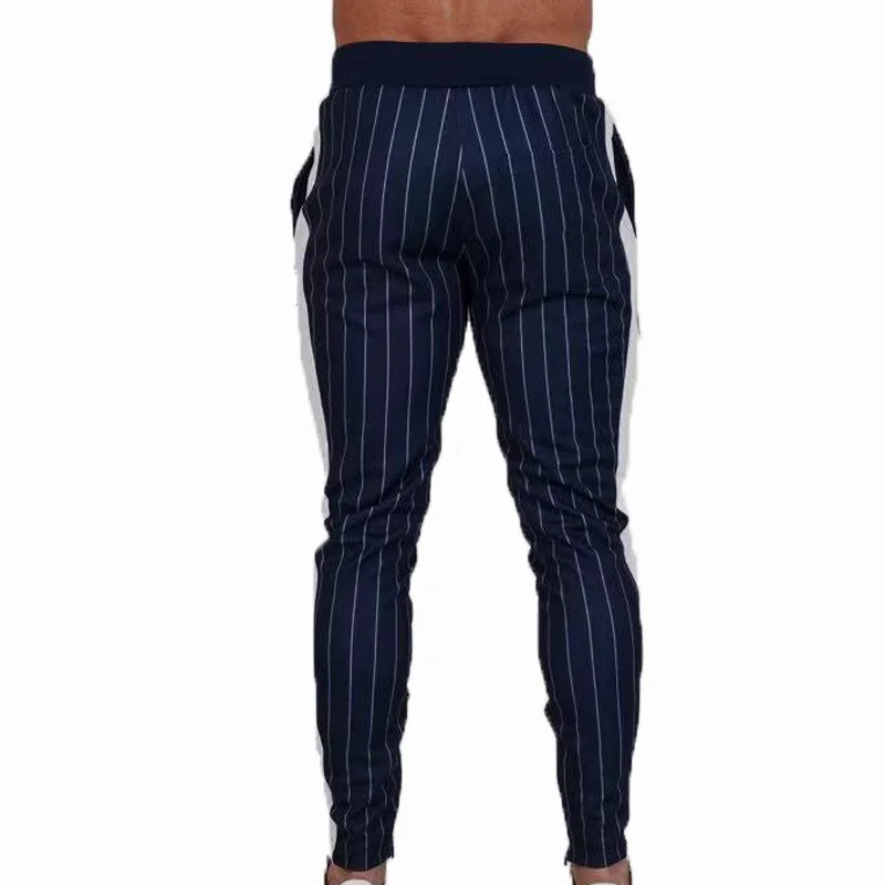 2019 New autumn, winter and spring men's running suit with light stripe coat and trousers fitness clothes selling like hot cakes 2019 New autumn, winter and spring men's running suit with light stripe coat and trousers fitness clothes selling like hot cakes