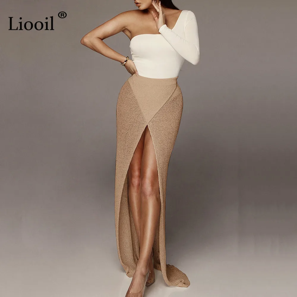Liooil выдалбливают сексуальный разрез трикотажная юбка для женщин Асимметричные летние юбки женские, макси Высокая талия белые вечерние пляжные длинные юбки