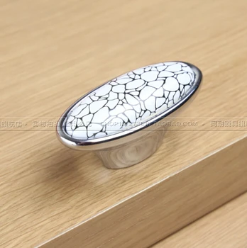 

The import of silver Ke resistant ceramic handle modern minimalist cabinet drawer wardrobe door handle small bronze gem