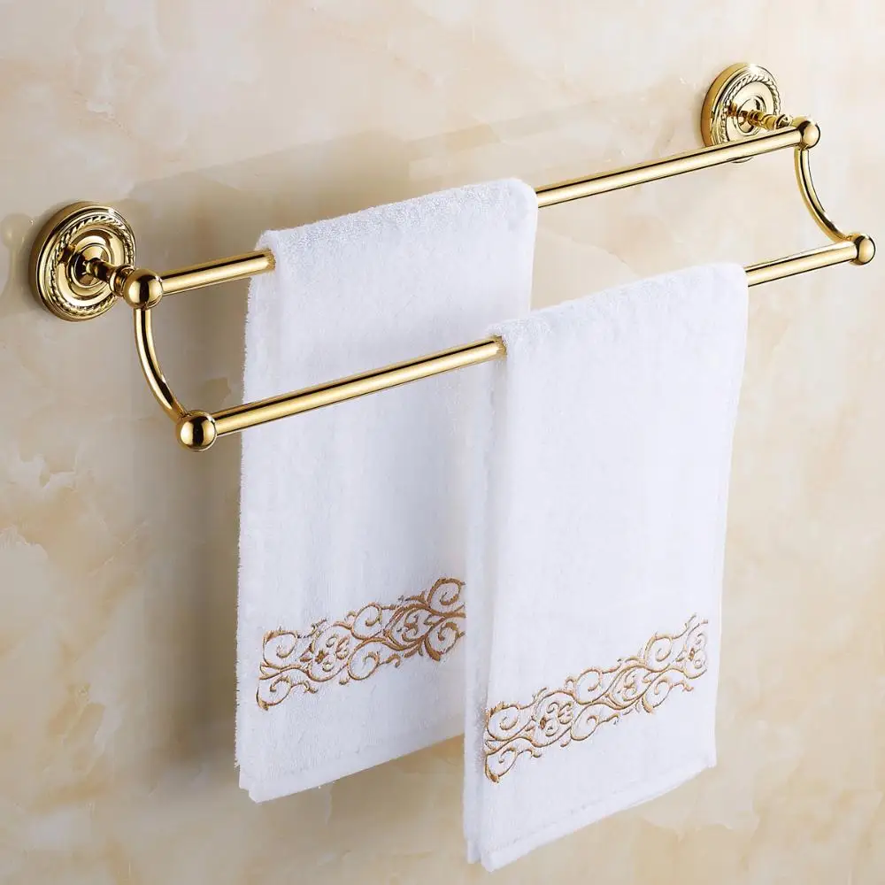 

golden bathroom towel shelf