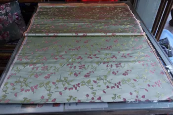 

chinese silk brocade woven damask damask fabric cheongsam cushion light green back with gold seeds and pink leaf pattern