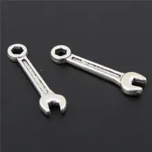 100 pçs feminino masculino bonito charme cor prata ferramenta criativa encantos pingente chave de metal a2898
