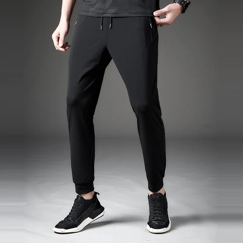

New men and women high elastic sweatpants running pants ice silk thin section breathable and quick-drying casual pants