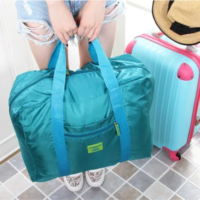 

2019 fashion waterproof large capacity travel bag ladies nylon folding bag unisex suitcase travel bag unisex travel backpack
