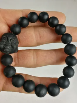 

The black stone Buddha head Bead Bracelet Elastic Bracelet