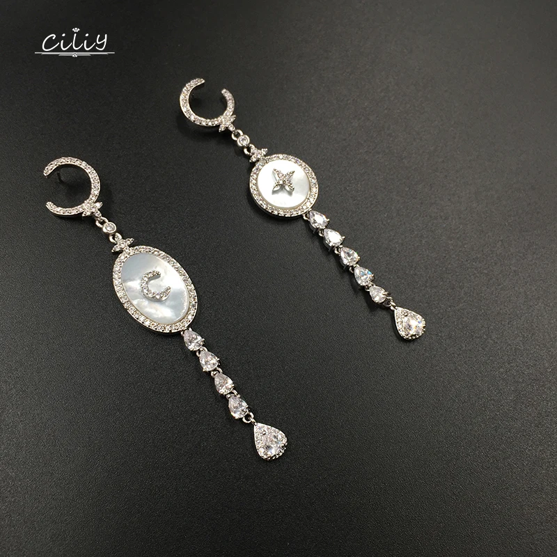 

Ciliy Shell Crystal Tassel Earrings Water Droplets Cubic Zirconia Luxury Star Moon Shape Design Earrings For Ladies A6530XM