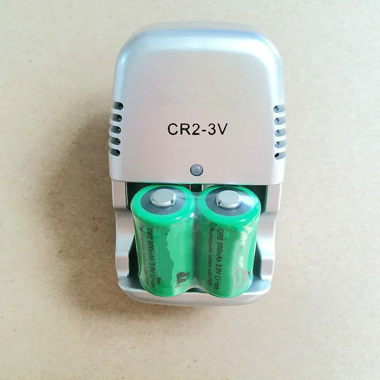 

New 3V CR2 charger+4 pcs. 15270 CR2 800mah rechargeable battery 3V , digital camera, made a special battery