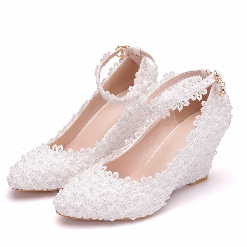 white wedge heels with bow