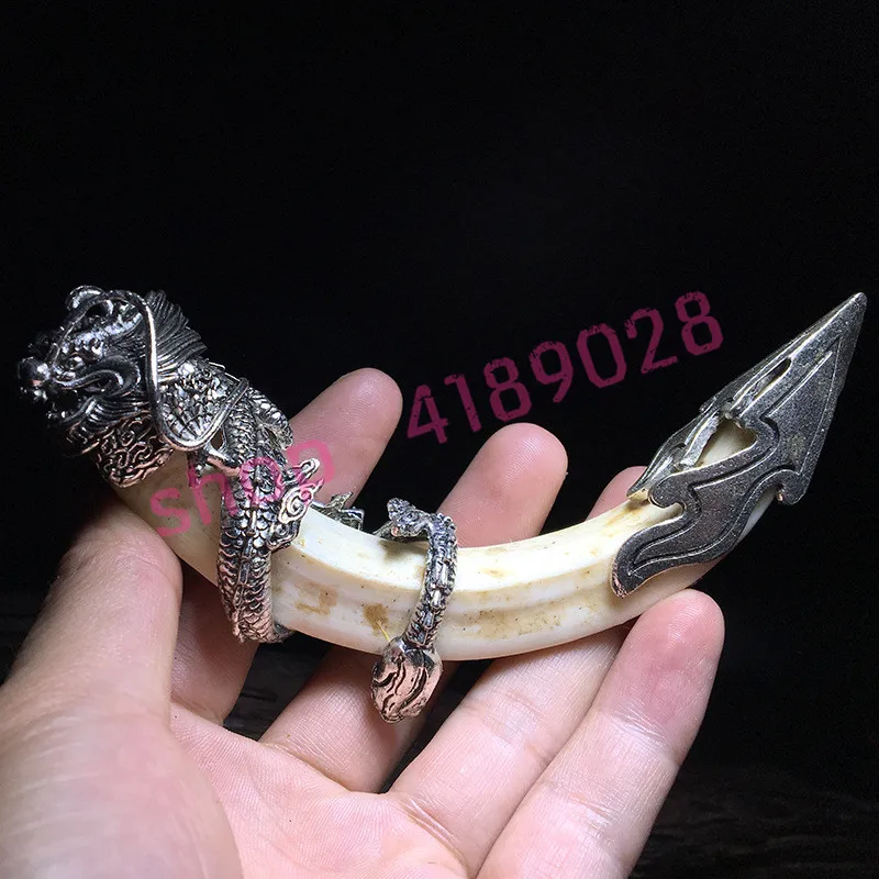 

Natural Tibetan Silver hand-made mosaic boar teeth, dragon totem modeling, handicrafts accessories