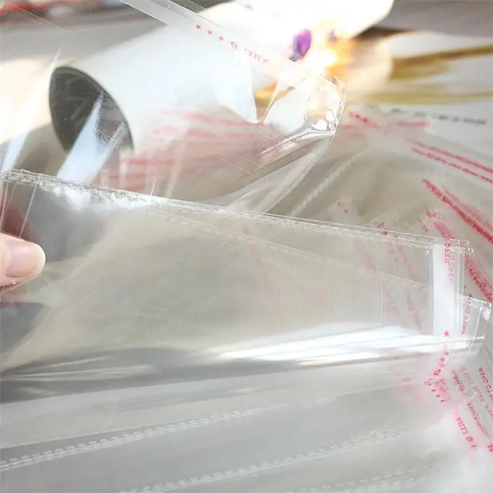 

100Pcs CD DVD Double Sided Cover Storage Case Plastic Bag Sleeve Envelope Hold