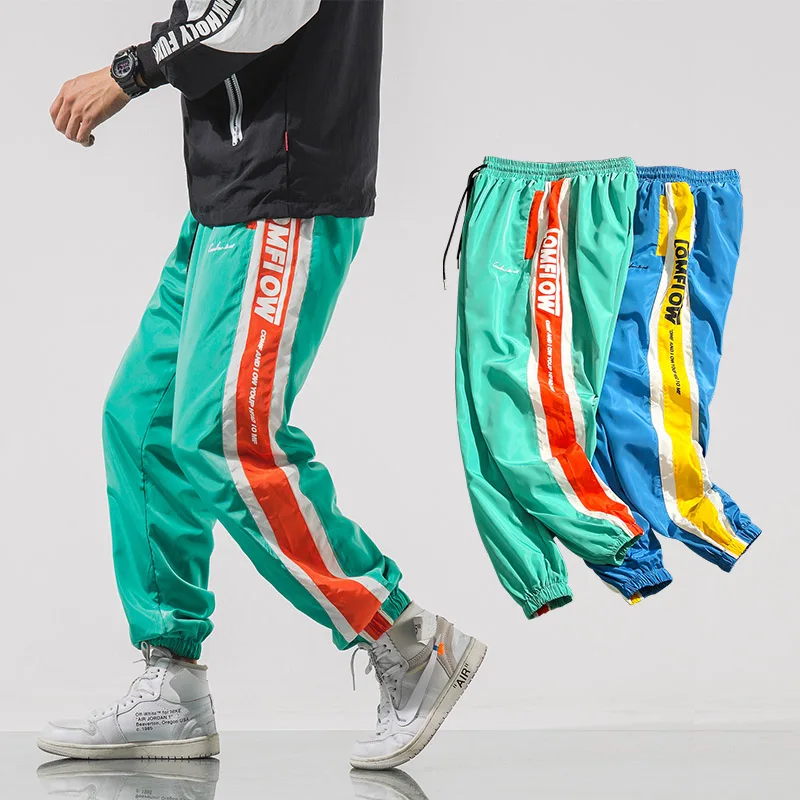 green track pants outfit