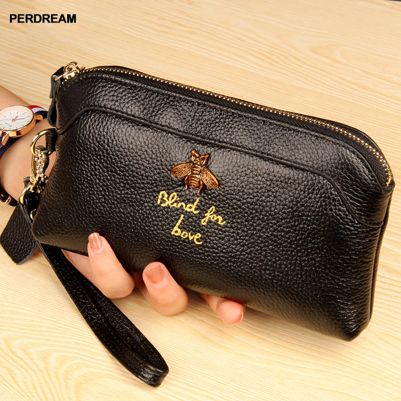 

The first layer of leather 2018 new women's leather small bees in Europe and America bills shell-shaped hand bag long wallet