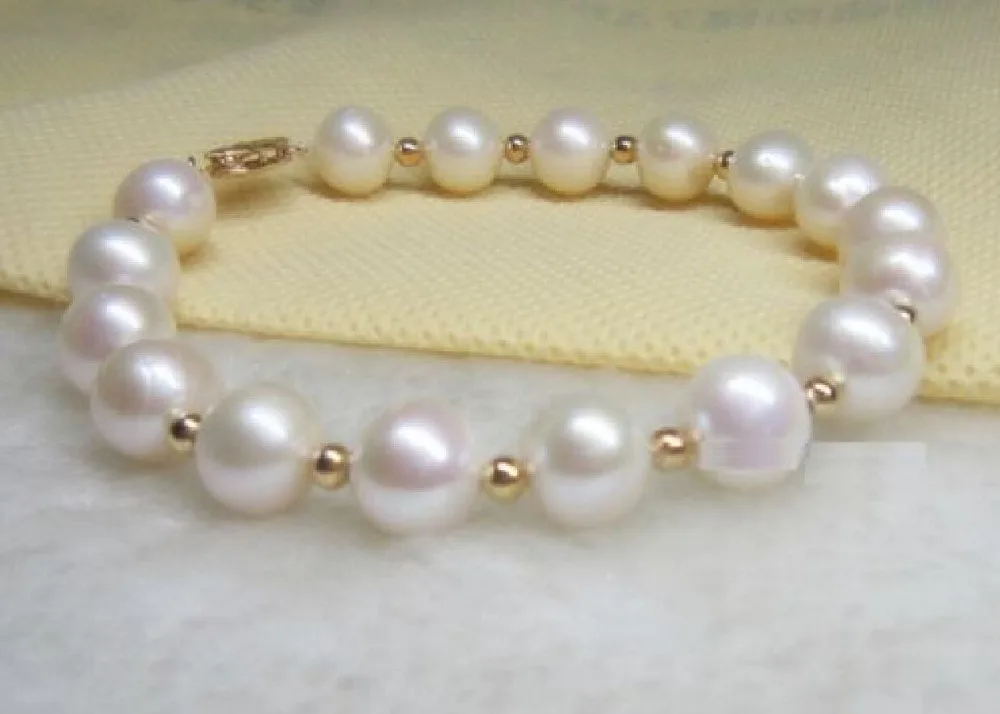 

Free Shipping >>>>> 10-11MM SOUTH SEA WHITE NATURAL PEARL BRACELET 7.5-8" 14K YELLOW GOLD CLASP