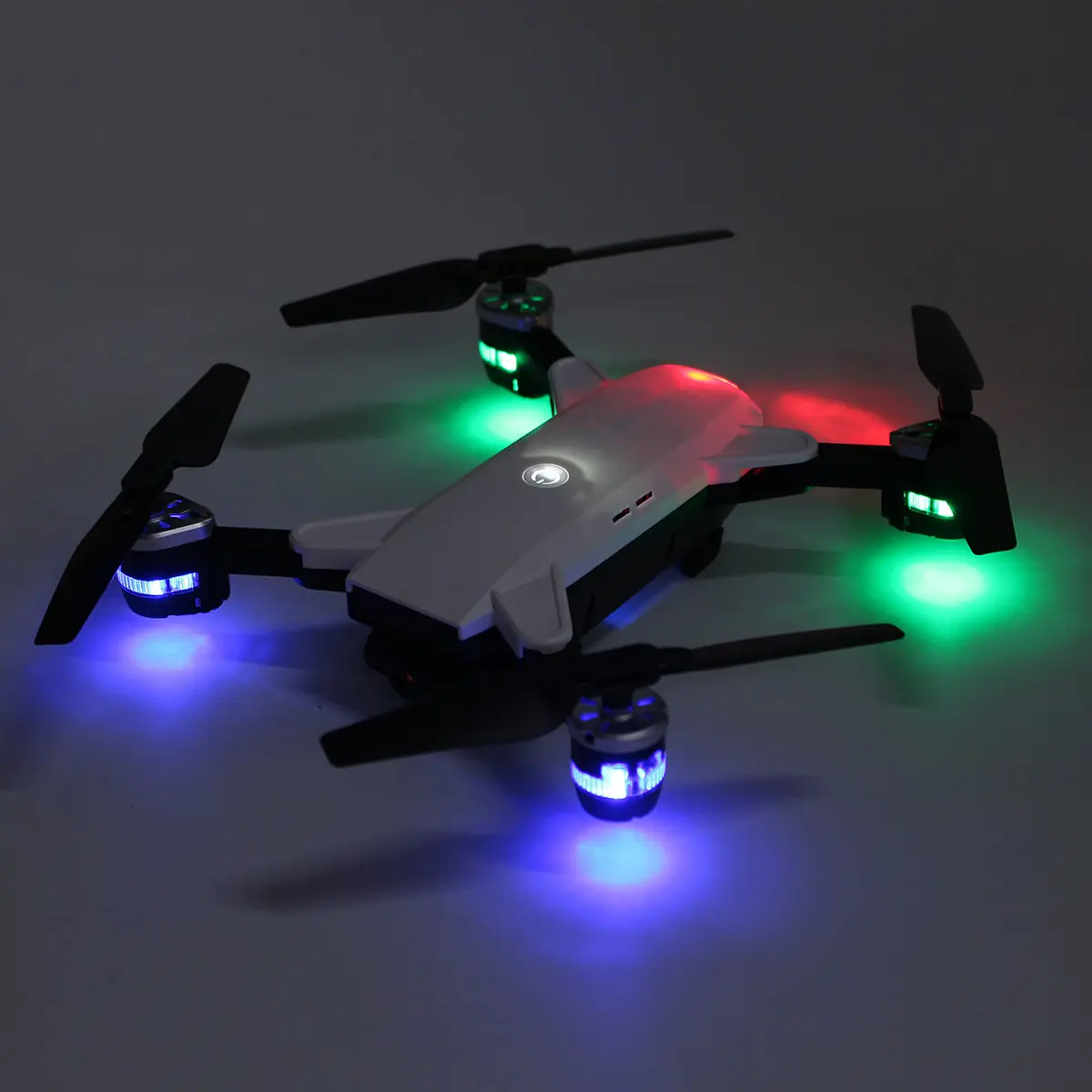 

HW Mini Foldable Selfie Drone with Wifi FPV 0.3MP Camera Altitude Hold Quadcopter LED Light Headless RC Helicopter Remote Games