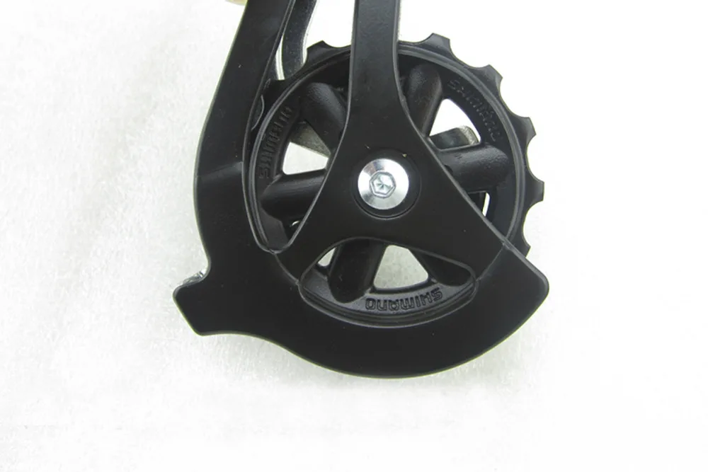 Задний переключатель передач SHIMANO RD M310 7/8 черный с прямым креплением детали для