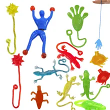 1 piece 9cm*3cm Silica gel robot Climbing Spider-Man sticky Spiderma Superman Climbing on glass for kids fuuny toy boy