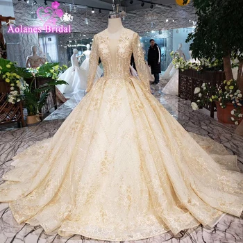 شراءفساتين زفاف فاخرة من الدانتيل باللون الذهبي الشامبانيا من Real Photo Vestido De Noiva بأكمام طويلة لعام 2019