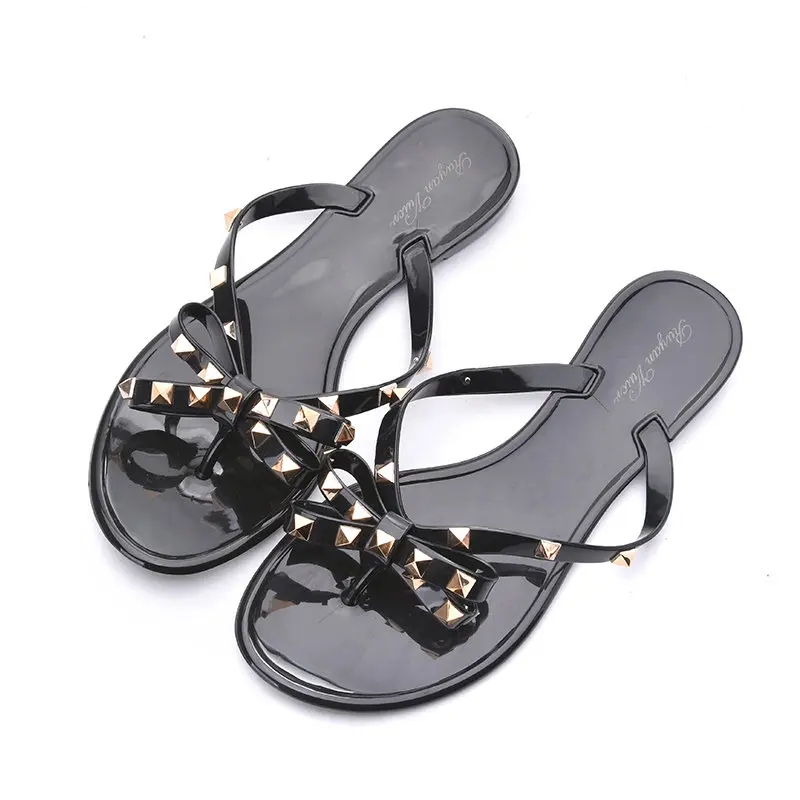 black plastic flip flops