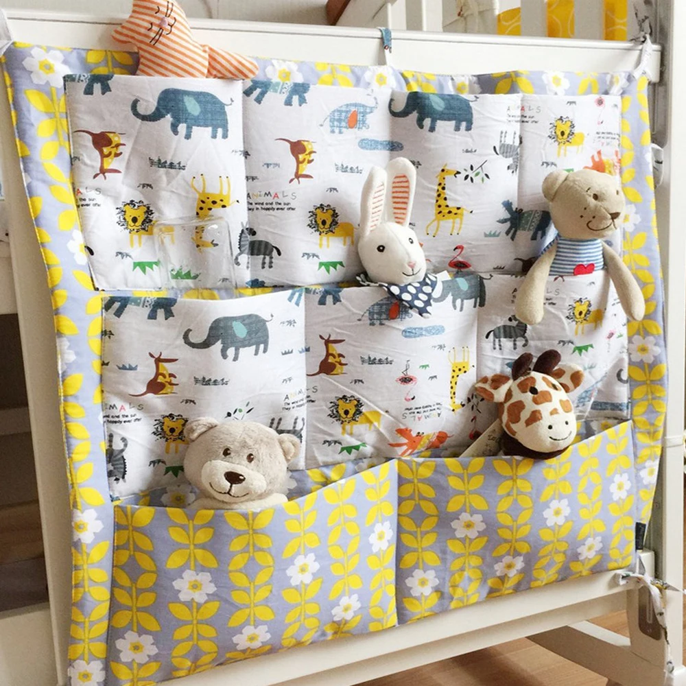 

High Quality New Baby Cot Bed Hanging Storage Bag ,Crib Organizer Toy Diaper Pocket For Crib Bedding Set 54*59CM