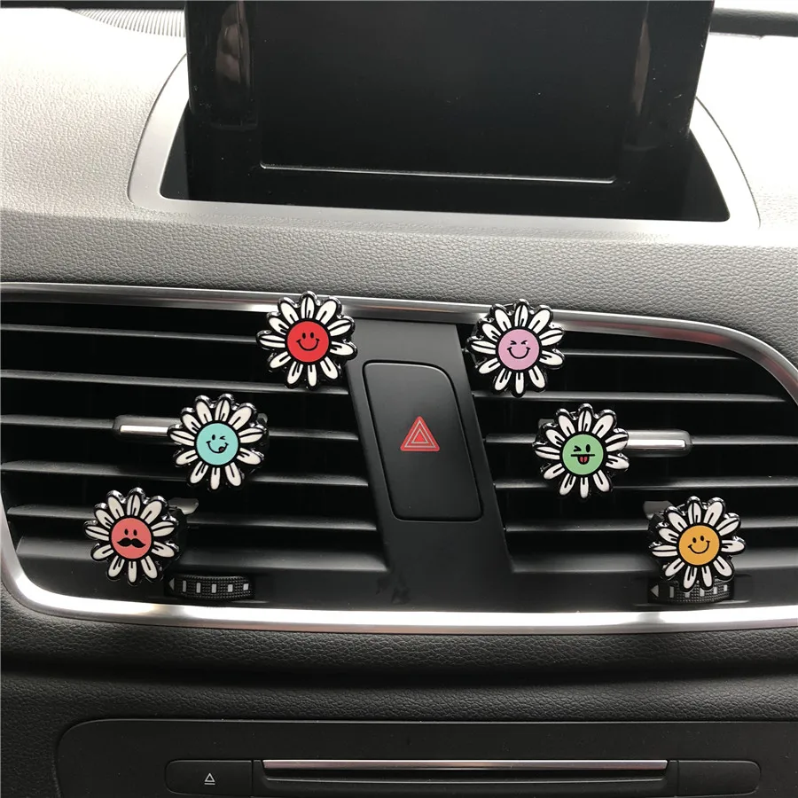 

Lovely colorful sunflower car modeling decoration perfume Plastic smile flower car perfume clip Air conditioner air freshener