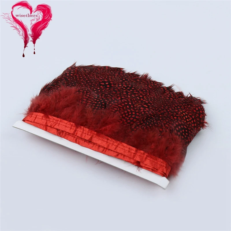 2 red guinea fowl feather trims 2