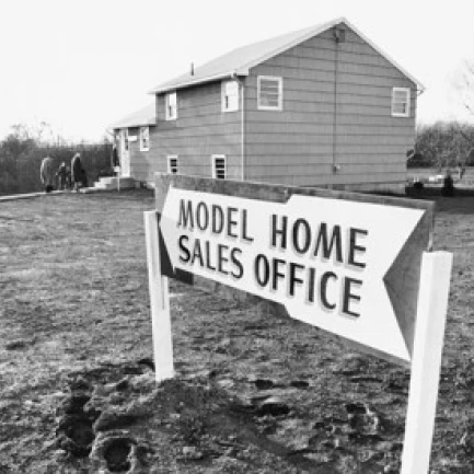 Information board in front of a model home Poster Print (24 x 36)