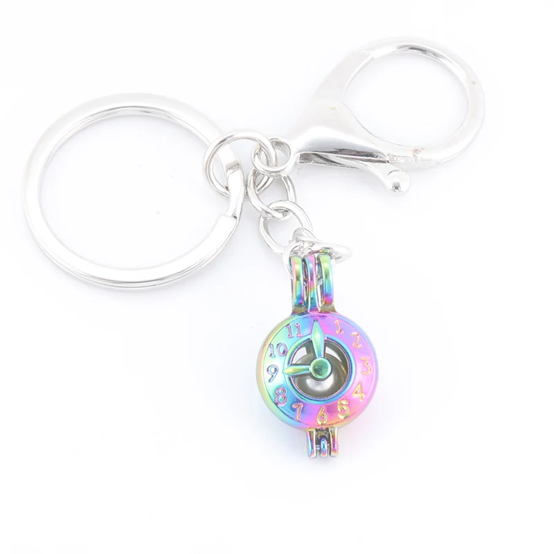 

DIY colors stainless steel pearl aromatherapy box clock shape metal pendant key chain fashion keychain jewelry wholesale SC282