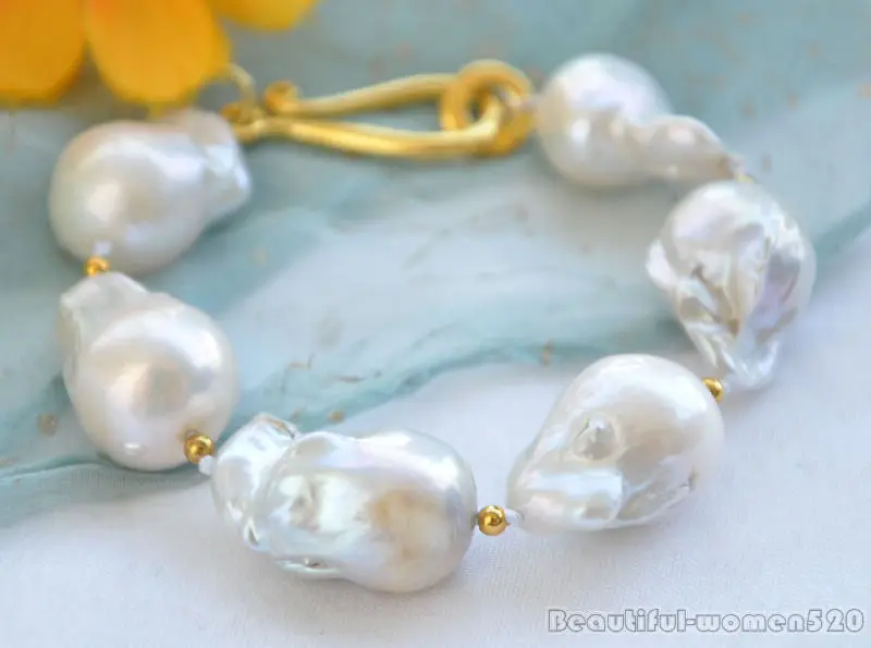 

Z5760 19mm WHITE BAROQUE KESHI REBORN PEARL BRACELET 8inch