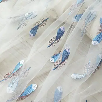 

1 yards off white embroidered tulle lace fabric with feathers,black embroidered blue feather lace fabric