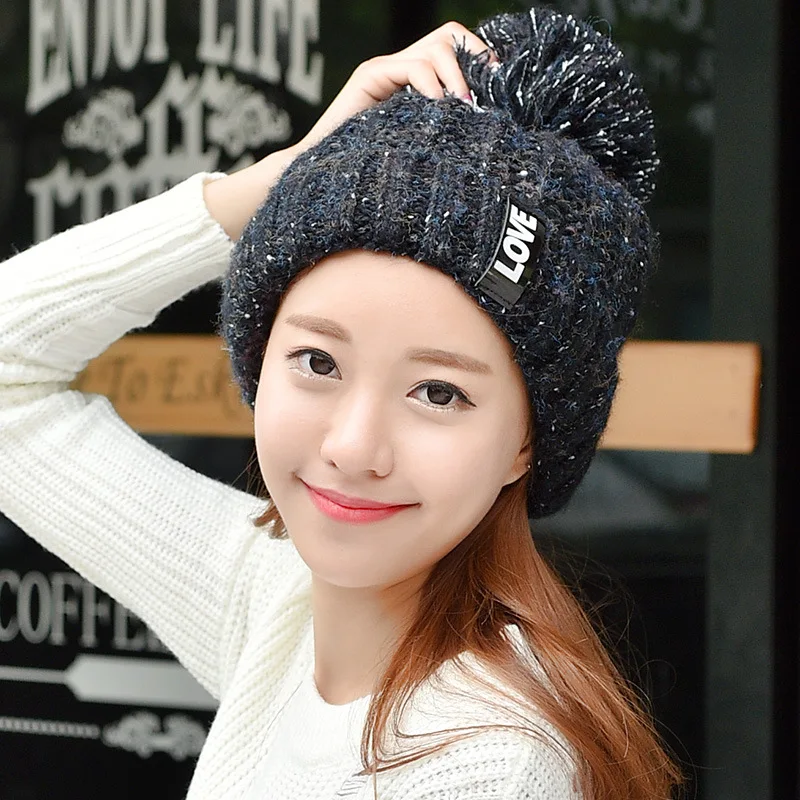 

The Autumn Winter Hat Lady Korean knitted hat letter sidehead Nagymaros ball of wool cashmere thermal curling Hat Cap