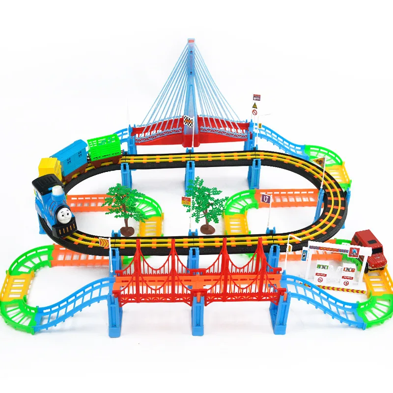 

Free Shipping 128PCS Puzzle Electric Music Sound Light Track Toy Track Toy Thomas train consists of plane, train, bus, tree