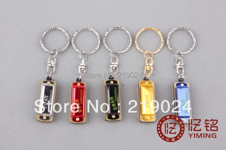 

Swan Mini harmonica 4 holes, 8 tones with keychain, not only a toy, it's real works