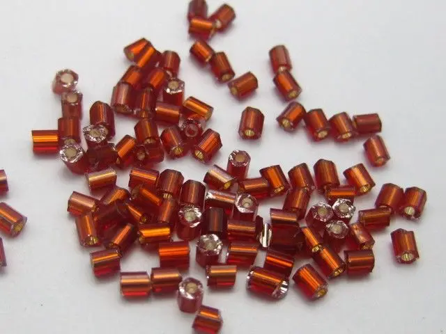 

5000 стеклянных трубчатых бусин 2x2мм с красной серебристой подкладкой + коробка для хранения