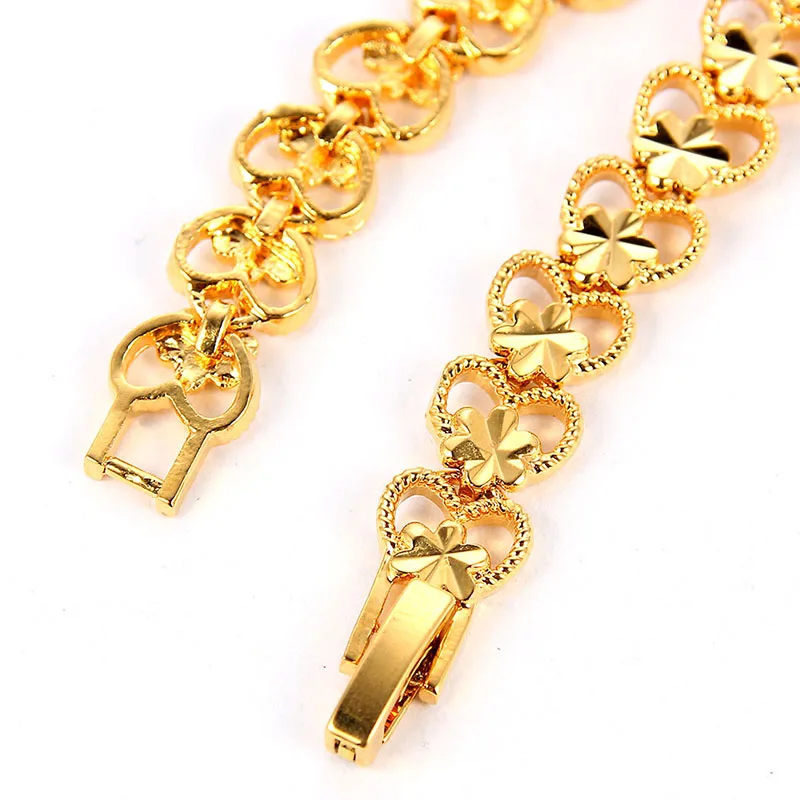 Woman's Gold Color Heart Charm Bracelets