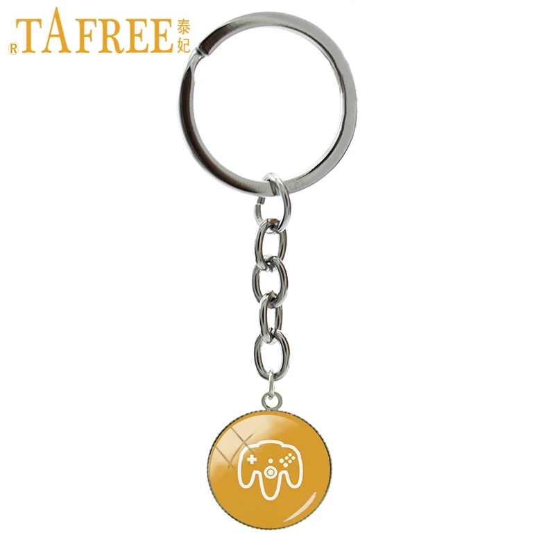 

TAFREE Game Controller Key Chain black white 8 bit video game style button 2 Keychain on a yellow background jewelry H644