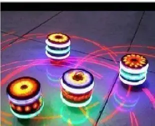 

Cheap Light Up Decoration Projection lamp flash brooch projector colorful laser spinning top light-up toy