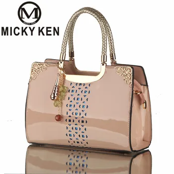 

MICKY KEN NEW 2018 NEW FASHION PATENT LEATHER HANDBAGS WOMEN FAMOUS BRAND TOTE BAGS BLACK HOLLOW OUT EMBOSSED SHOULDER BAGS