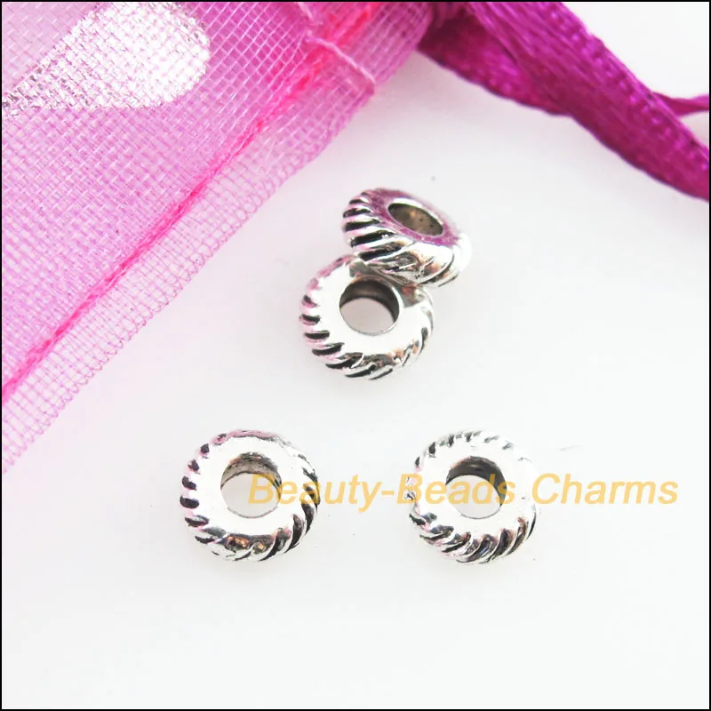 

New 60Pcs Tibetan Silver Tone Wheel Round Spacer Beads Charms 5.5mm