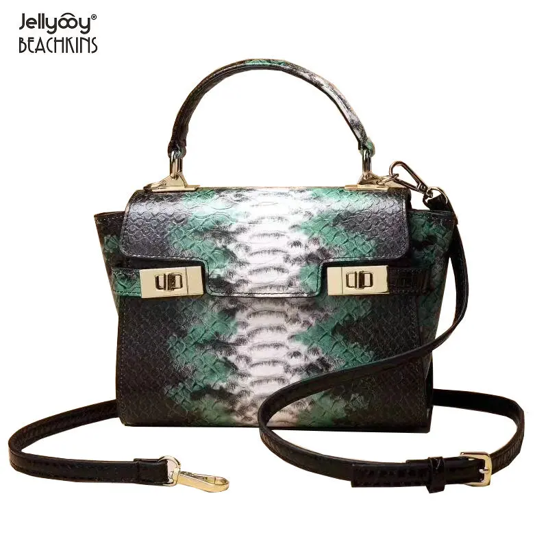 

Vogue of new fund of 2019 ms cowhide leather female baotou layer python lines one shoulder aslant handbag fashion handbags